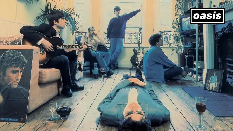 A Candid Image Of The Members Of Oasis Band Casually Lounging