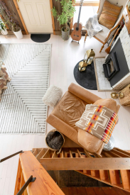 Cozy Scandinavian Interior with Leather Chair and Fireplace  Free Stock Photo Pinpict