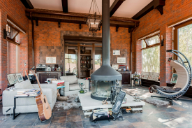 Living Room with Leather Armchairs and Hammock Chair Around the Fireplace Free Stock Photo Pinpict